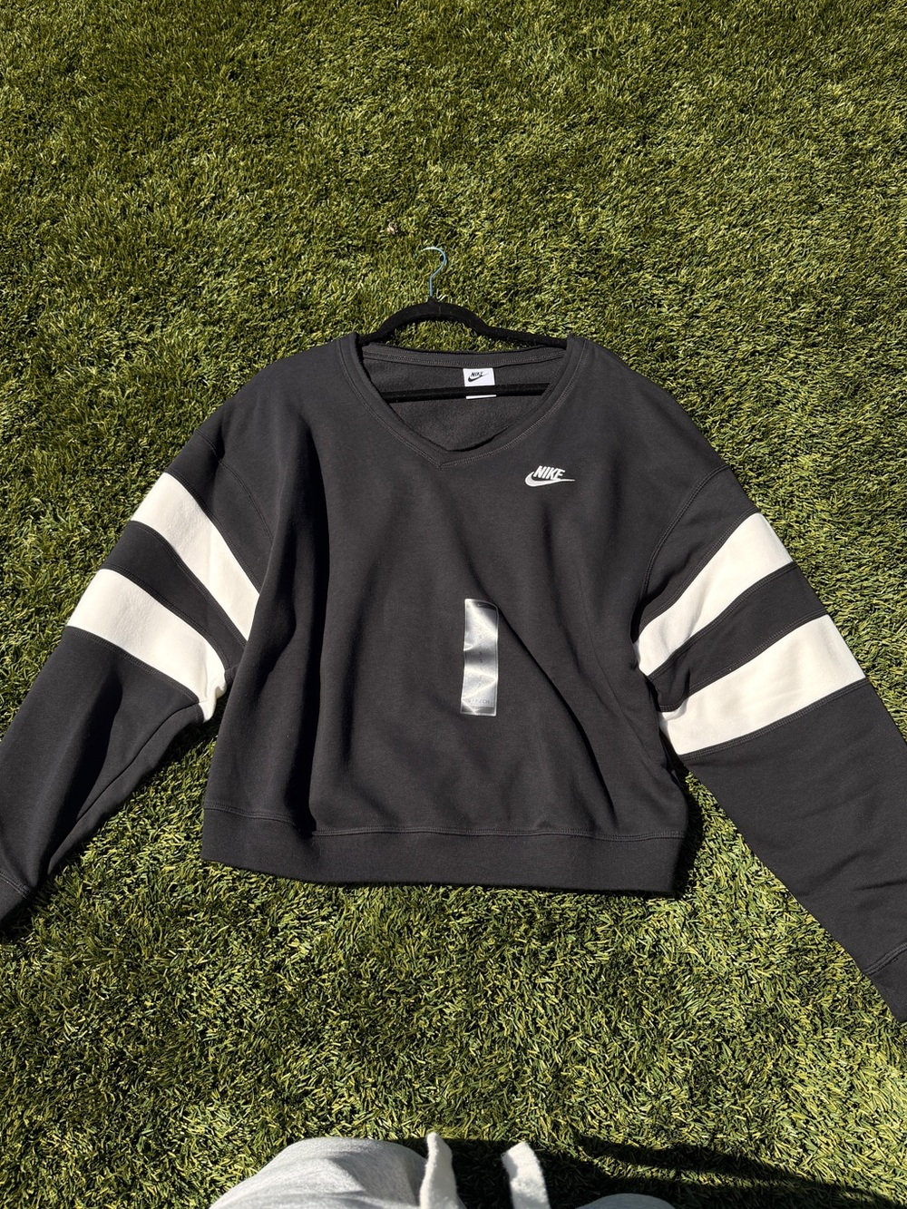 Nike Black V-Neck Women's Pullover with White Sleeve Stripes